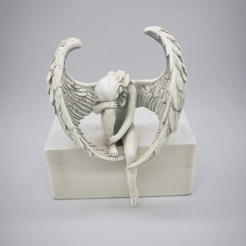 Leg Holding Angel Ornament